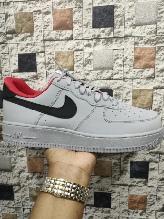 Nike Air Force 1 Laced White rubber sole Sneakers with a black logo 