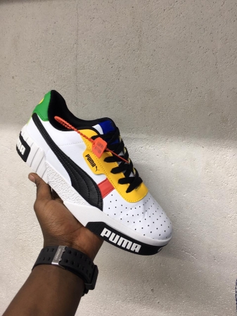 white black patch with yellow theme rubber sole round toe laced rubber  puma sport shoe