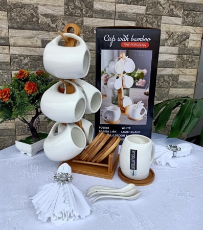 White set of 6 cups Comes with bamboo stand Bamboo wooden saucers 6 ceramic spoons 220 ml capacity