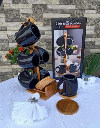 Black set of 6 cups Comes with bamboo stand Bamboo wooden saucers 6 ceramic spoons 220 ml capacity
