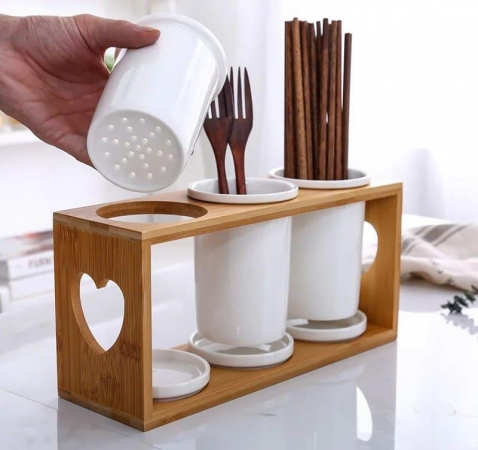 Ceramic cutlery organizer with bamboo stand that Has three holders 