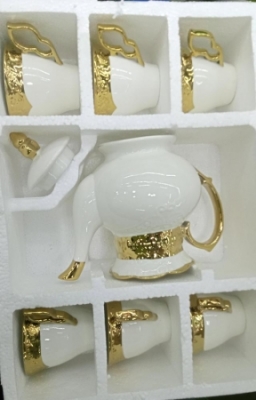 Gold themed ceramic tea set