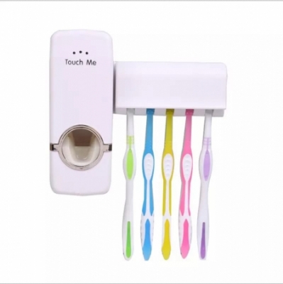 Touch me toothpaste dispenser and holder