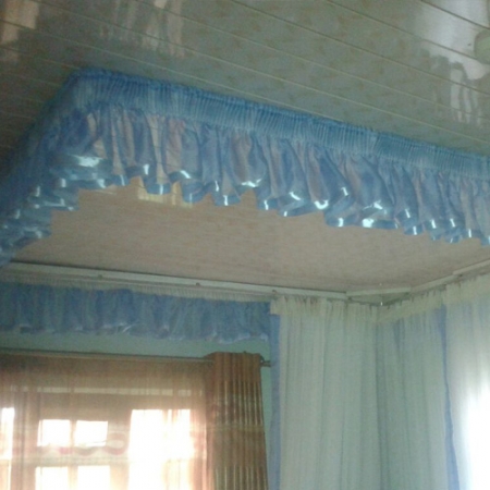 Shiny Blue Mounted Mosquito nets with drapes and shinny ribbons for that precious bedroom, Hotel room or even your Airbnb rooms.