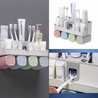 Toothpaste dispenser with 4 cups