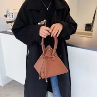 Brown Classy triangular lady handbag 