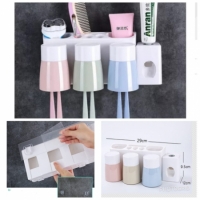 Bathroom wall suction with toothbrush holder toothpaste dispenser