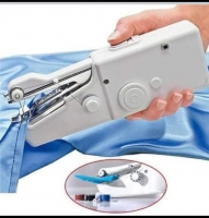 Hand held portable sewing machine 