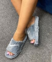 grey Nike fluffy sandals