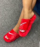 hot red Nike fluffy sandals