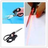 Buy this Lightweight, easy to use and carry brand new and high quality Professional Laser Guided Sewing Cut Straight Fast Fabric Paper Crafts Scissor