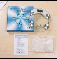 Personal weighing scale with glass top